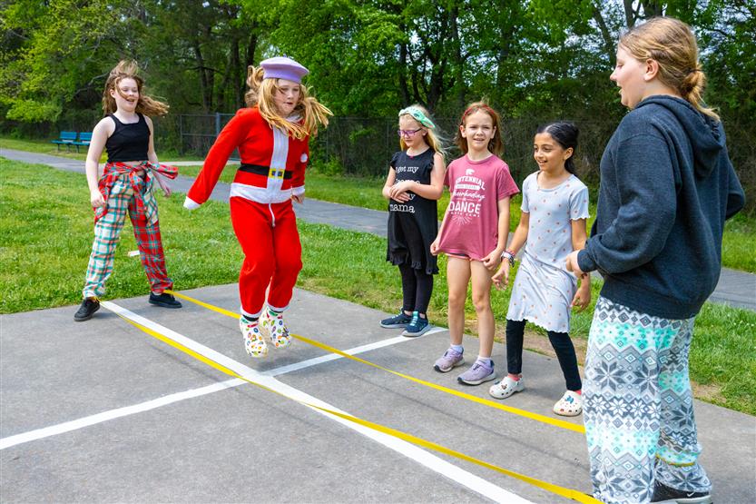 Students dance outside